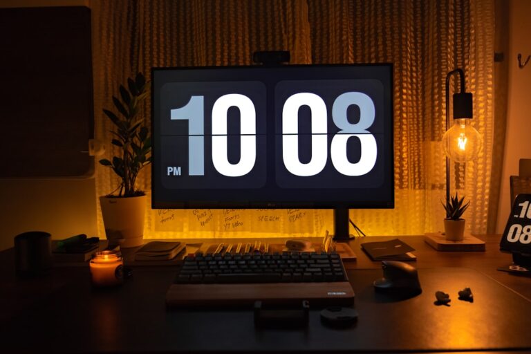 a desktop computer sitting on top of a wooden desk