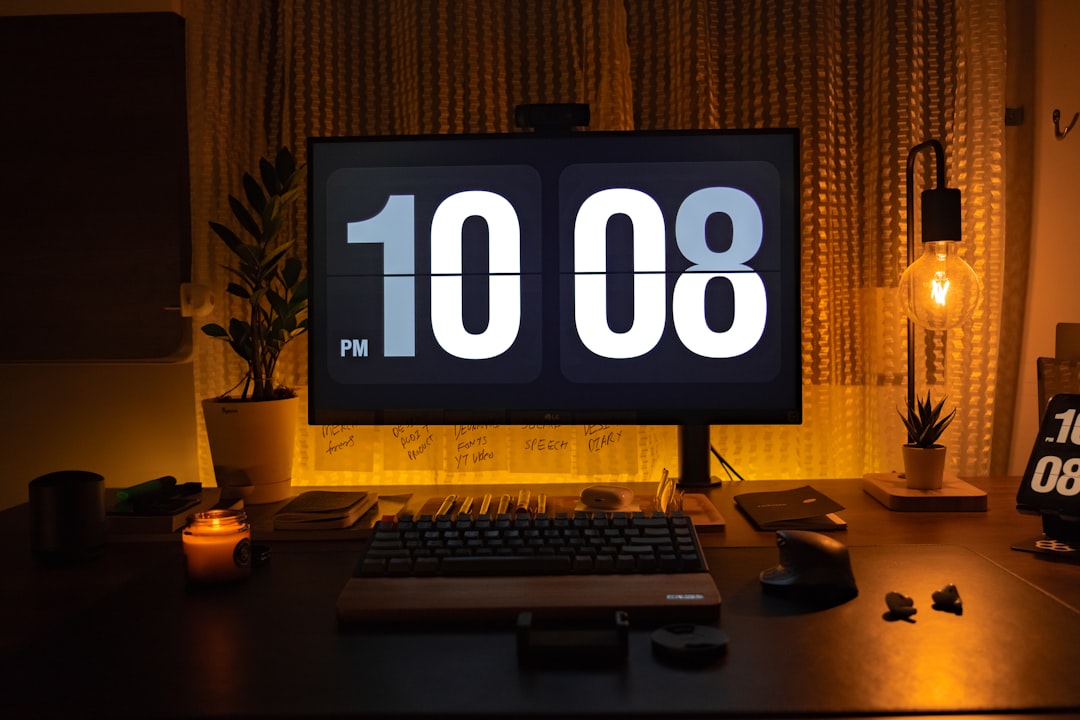 a desktop computer sitting on top of a wooden desk